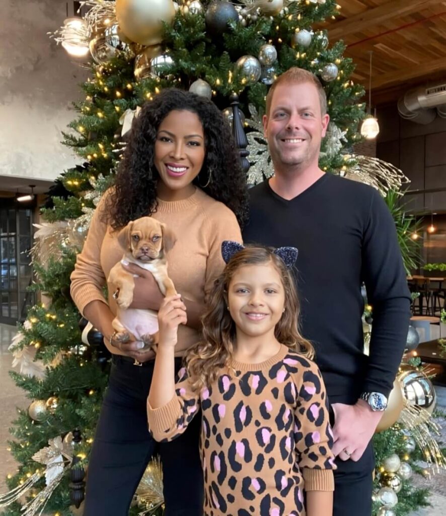 Stacey Rusch with her husband and daughter
