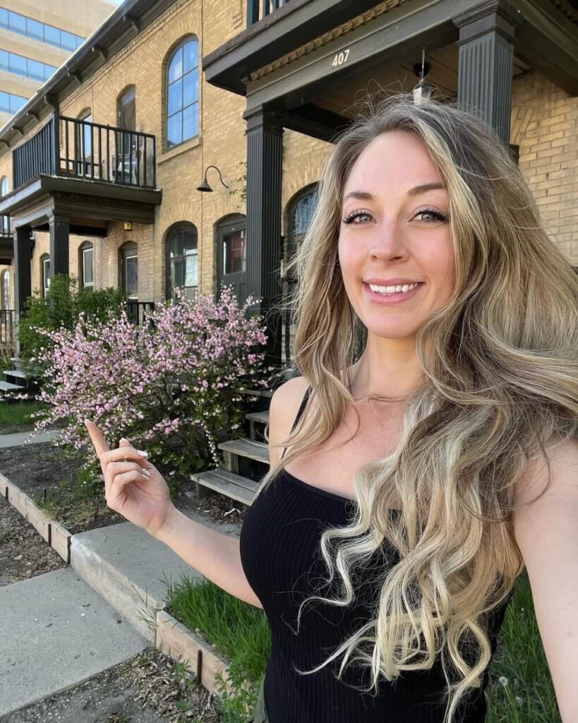 Brittany Arnason pic with her first owned house