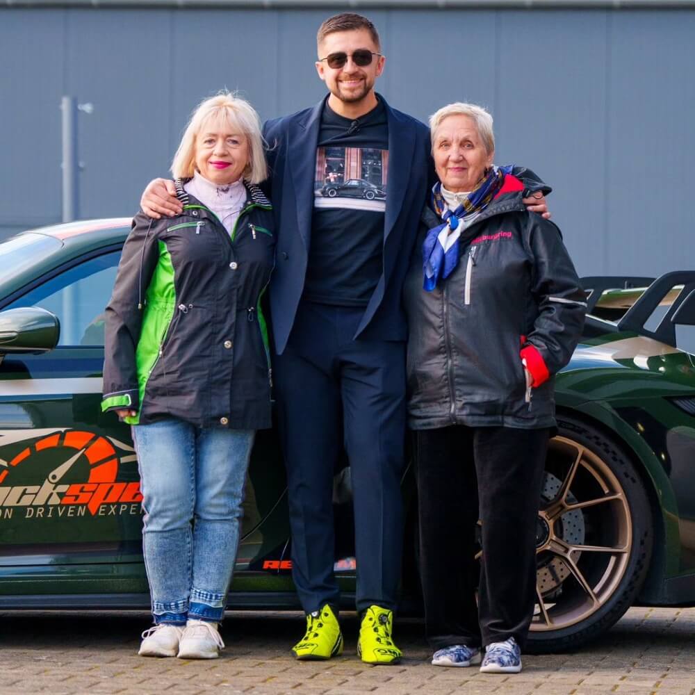Misha Charoudin with his mother and grandmother