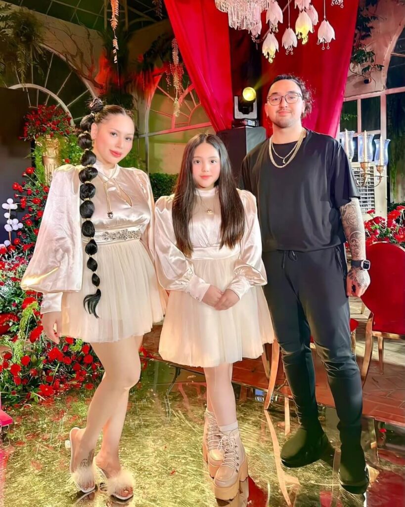 Vince Flores and his wife and daughter