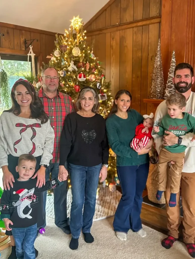 Brenna Weick with husband and family